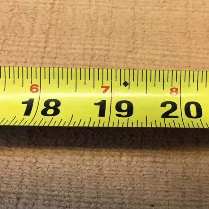 the black diamond on a tape measure for