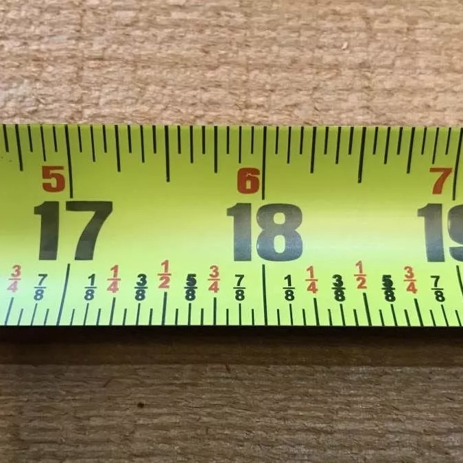 half of 5/8 on a tape measure
